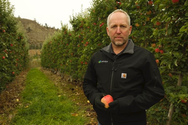 Semios CEO & Founder, Michael Gilbert in apple orchard